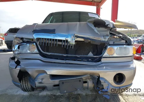 2000 Lincoln Navigator z USA, uszkodzony, nr VIN 5LMFU28AXYLJ24478